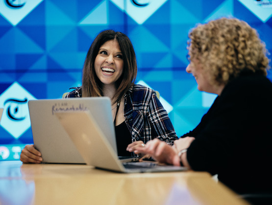 Telegraph Careers - Jobs in Media, Editorial, Sales and Corporate - Image of Two Woman With Laptops Smiling.jpg